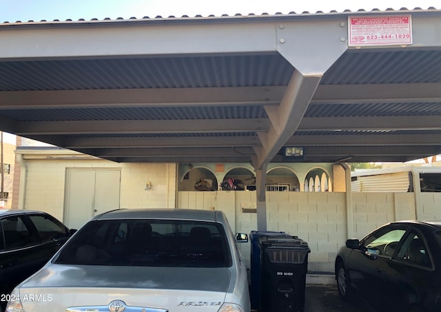 view of parking with a carport