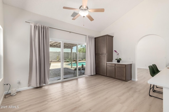 12529 N 83rd Ln, Peoria, AZ 85381 - office with light wood-type flooring, a ceiling fan, baseboards, and vaulted ceiling