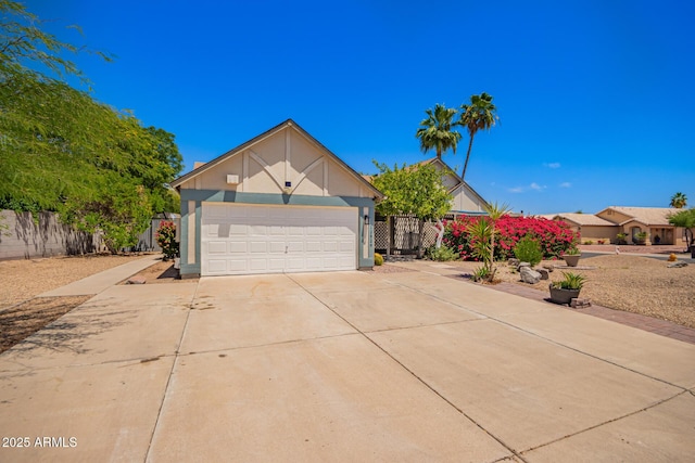 12529 N 83rd Ln, Peoria, AZ 85381 - view of front of home with concrete driveway and a garage