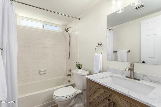 12529 N 83rd Ln, Peoria, AZ 85381 - full bathroom featuring toilet, shower / bath combo, and vanity