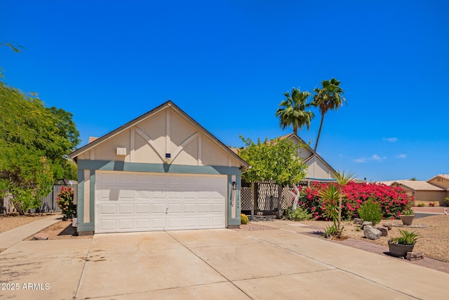12529 N 83rd Ln, Peoria, AZ 85381 - view of front facade featuring driveway, stucco siding, and a garage
