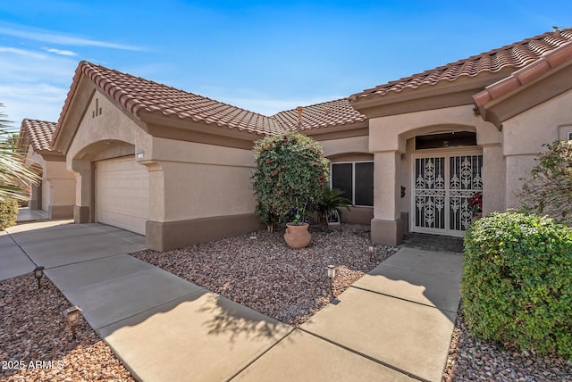 view of front of home featuring a garage