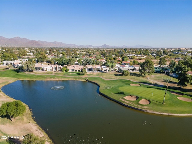 drone / aerial view with a water and mountain view