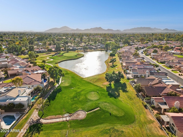 aerial view featuring a water and mountain view