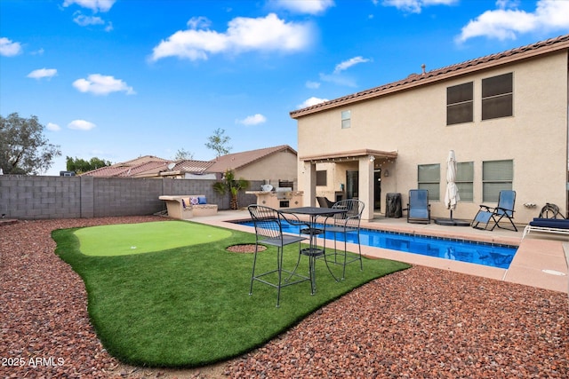 view of pool with a fenced in pool, a fenced backyard, and a patio area