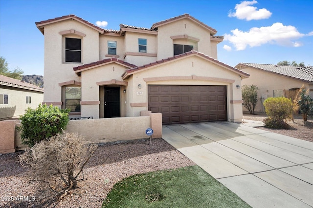 mediterranean / spanish house featuring fence, an attached garage, stucco siding, concrete driveway, and a tile roof