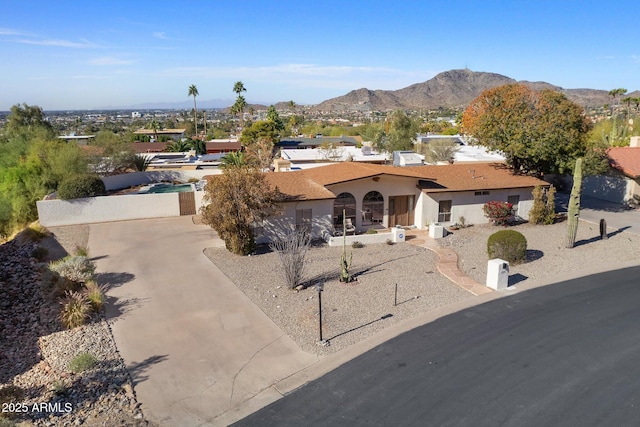 view of front of home with a mountain view