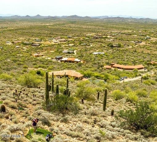 birds eye view of property featuring a rural view and a mountain view