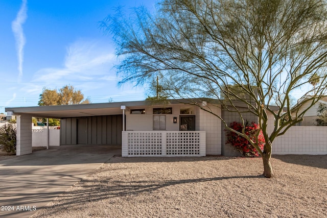 view of front of house featuring a carport