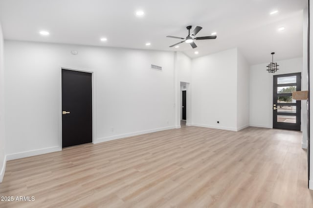 unfurnished living room with recessed lighting, a ceiling fan, and light wood-style floors