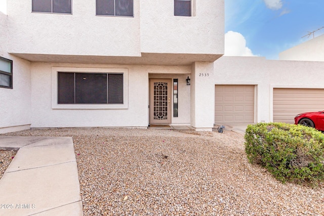 view of front of home with a garage