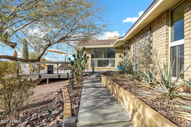 exterior space featuring a wooden deck