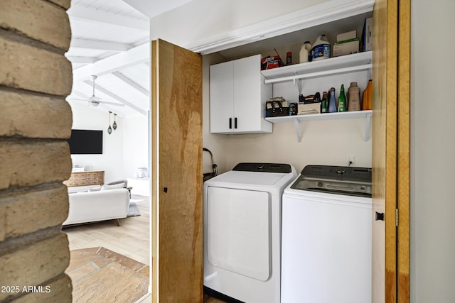 laundry area with cabinets, ceiling fan, light hardwood / wood-style floors, and washer and dryer