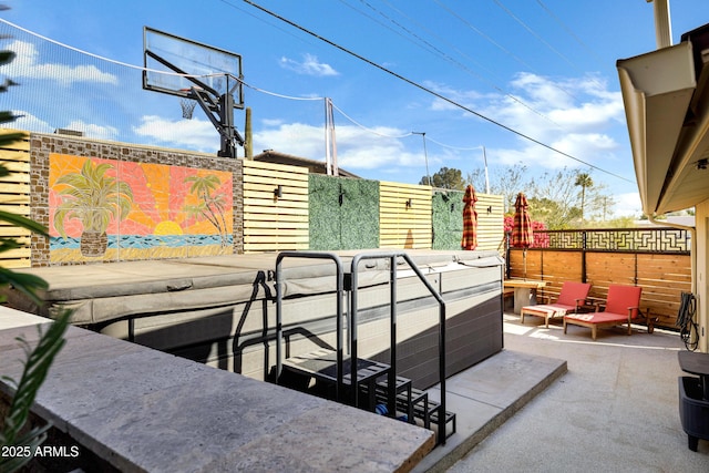 view of patio / terrace featuring basketball court