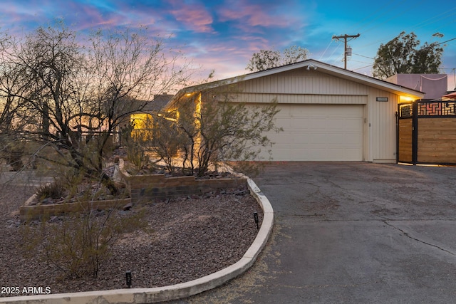 view of front of property with a garage