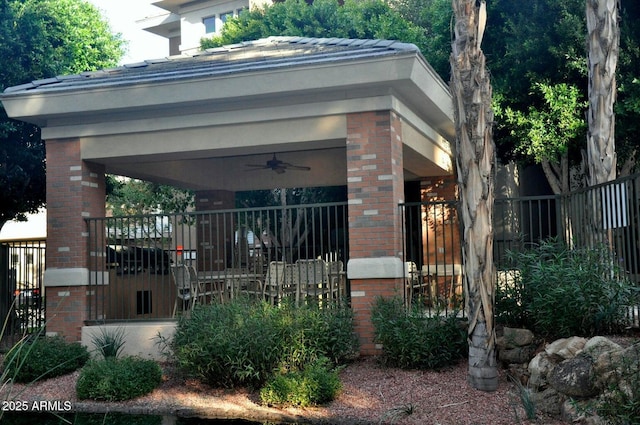 2989 N 44th St N Unit 2007, Phoenix, AZ 85018 - view of side of home with brick siding and a ceiling fan
