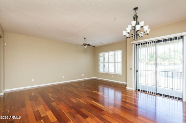 2989 N 44th St N Unit 2007, Phoenix, AZ 85018 - unfurnished room with a chandelier, baseboards, ceiling fan, and wood finished floors