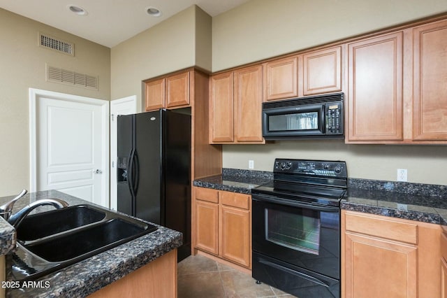 2989 N 44th St N Unit 2007, Phoenix, AZ 85018 - kitchen featuring black appliances, a sink, dark tile patterned flooring, tile countertops, and recessed lighting