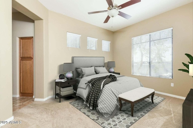 2989 N 44th St N Unit 2007, Phoenix, AZ 85018 - bedroom with carpet flooring, baseboards, and ceiling fan