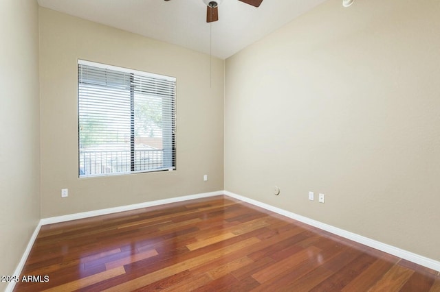 2989 N 44th St N Unit 2007, Phoenix, AZ 85018 - spare room with ceiling fan, wood finished floors, and baseboards