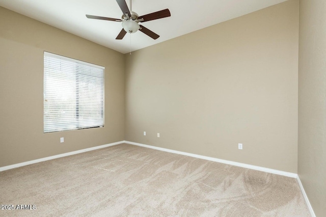 2989 N 44th St N Unit 2007, Phoenix, AZ 85018 - unfurnished room featuring light carpet, baseboards, and ceiling fan