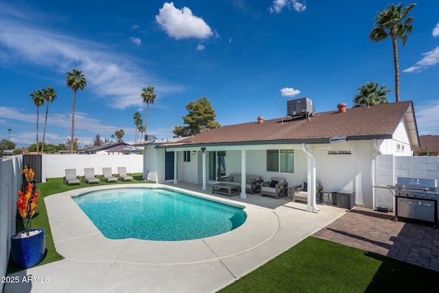 1800 W Shawnee Dr, Chandler, AZ 85224 - view of swimming pool with outdoor lounge area, a grill, a patio, a fenced backyard, and cooling unit