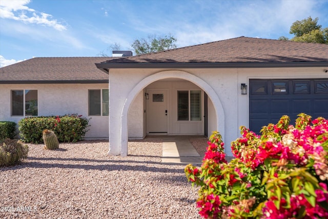 1800 W Shawnee Dr, Chandler, AZ 85224 - view of front facade with an attached garage, stucco siding, and roof with shingles