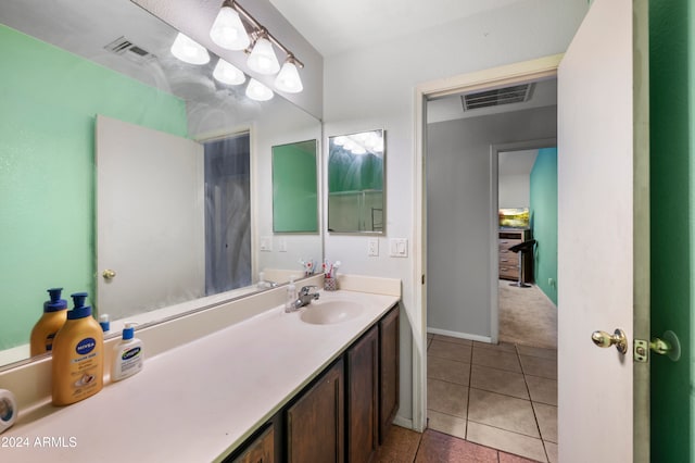 bathroom featuring vanity and tile patterned floors