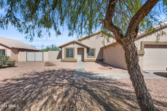 single story home featuring a garage