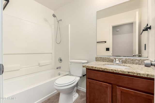 full bathroom with tile patterned floors, toilet, shower / washtub combination, and vanity