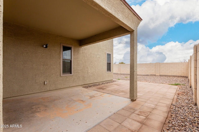 view of patio with a fenced backyard