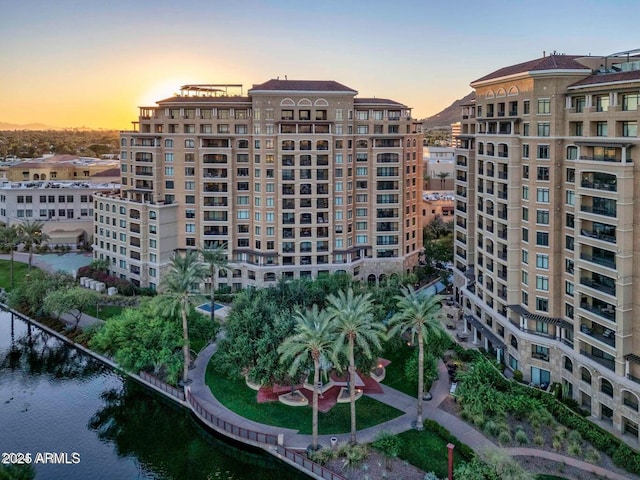 outdoor building at dusk with a water view