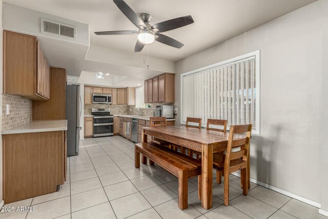 840 N Acacia, Mesa, AZ 85213 - dining space featuring ceiling fan and light tile patterned floors