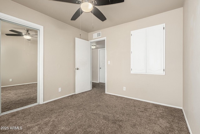 840 N Acacia, Mesa, AZ 85213 - unfurnished bedroom featuring carpet, a ceiling fan, and a closet