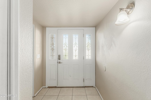 840 N Acacia, Mesa, AZ 85213 - foyer featuring light tile patterned flooring and a textured wall
