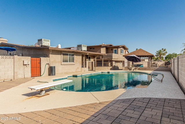 840 N Acacia, Mesa, AZ 85213 - view of swimming pool featuring a fenced backyard, a gazebo, a patio area, and a diving board
