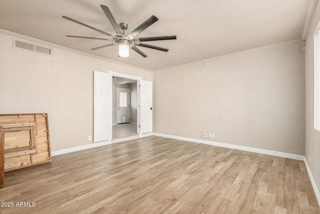 840 N Acacia, Mesa, AZ 85213 - spare room featuring a ceiling fan, crown molding, and light wood-style flooring