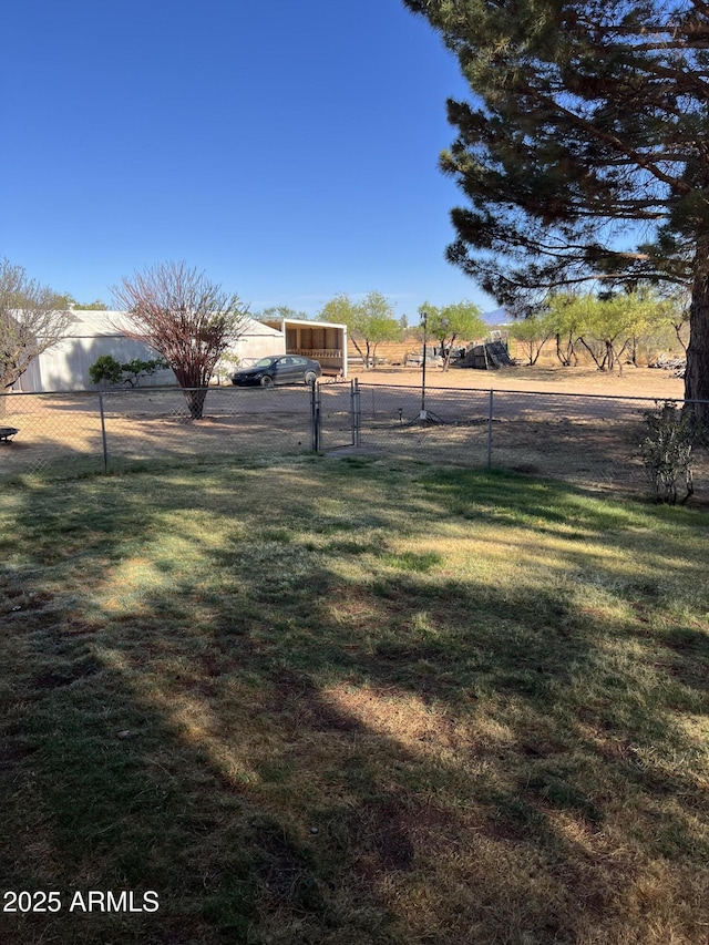 view of yard featuring fence