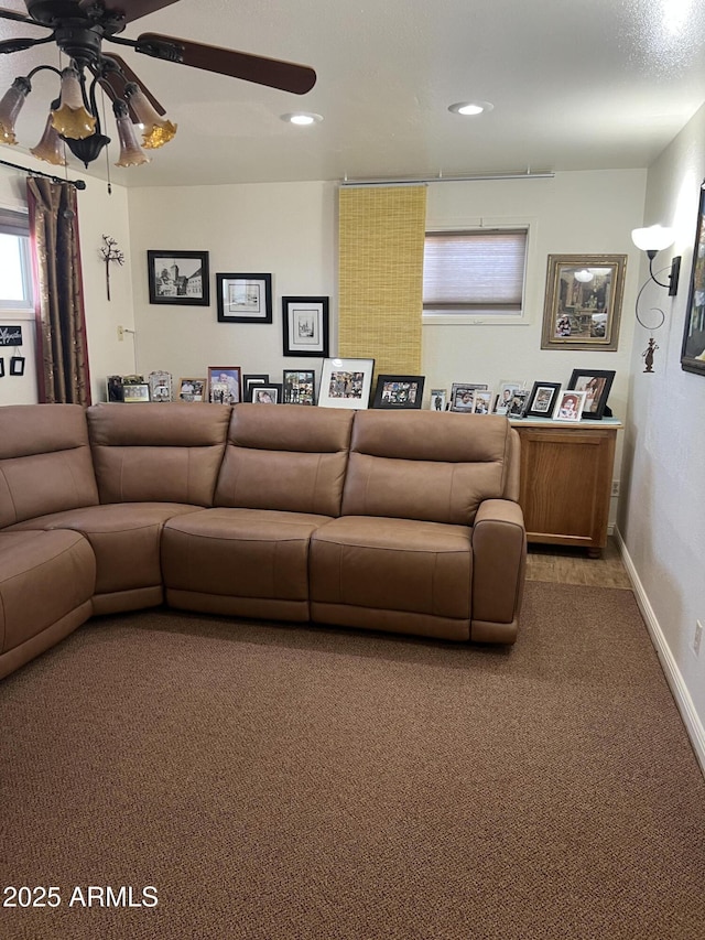 living room with recessed lighting, carpet flooring, baseboards, and a ceiling fan