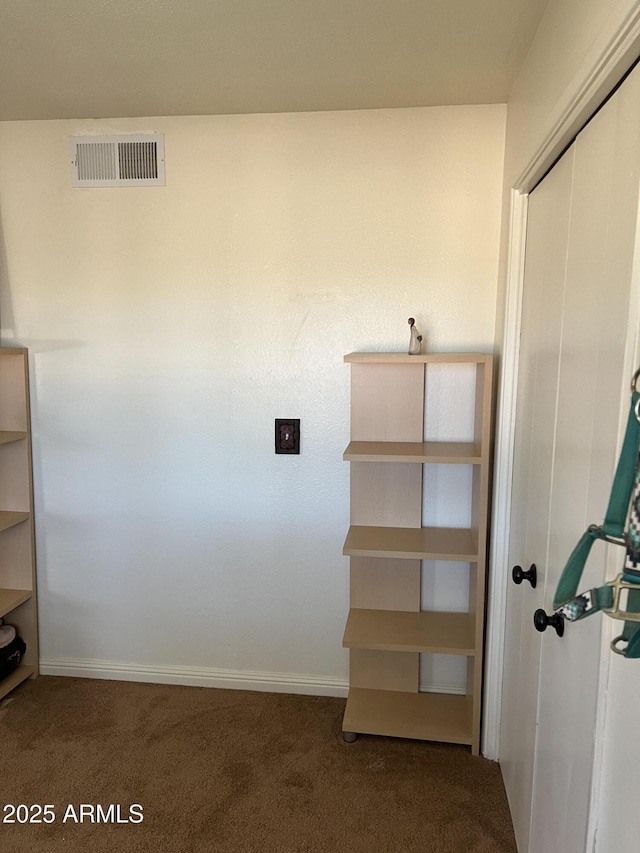 closet featuring visible vents