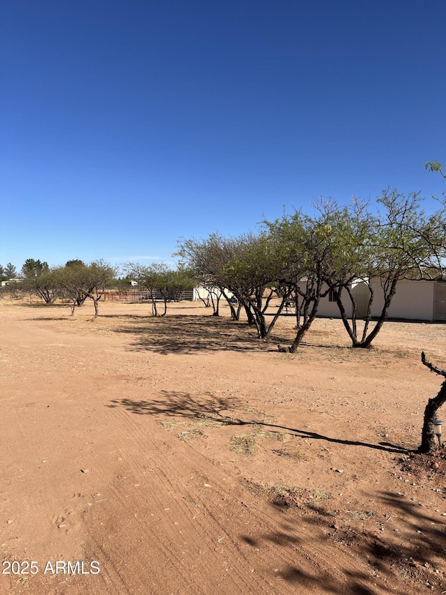 view of yard featuring a rural view