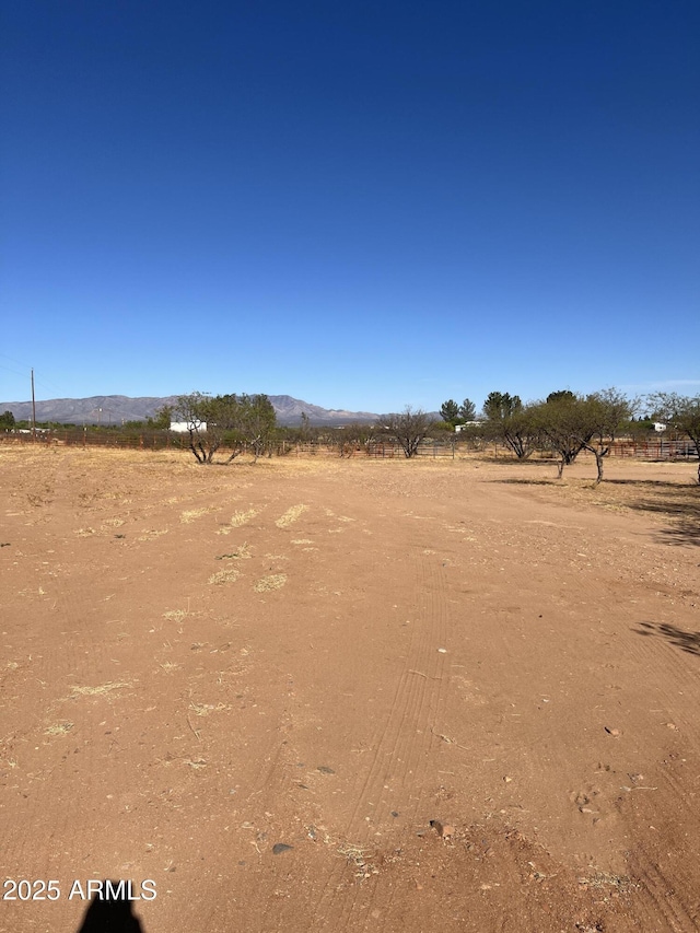 view of nature with a rural view and a mountain view