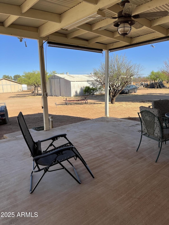 view of patio with a ceiling fan