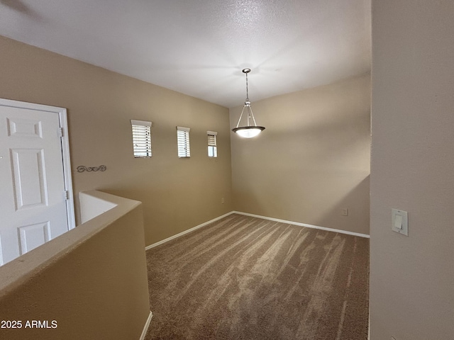 3434 E Baseline Rd Unit 204, Phoenix, AZ 85042 - carpeted spare room featuring baseboards