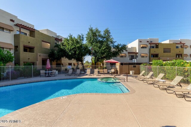 3434 E Baseline Rd Unit 204, Phoenix, AZ 85042 - view of pool with a patio and a pool with connected hot tub