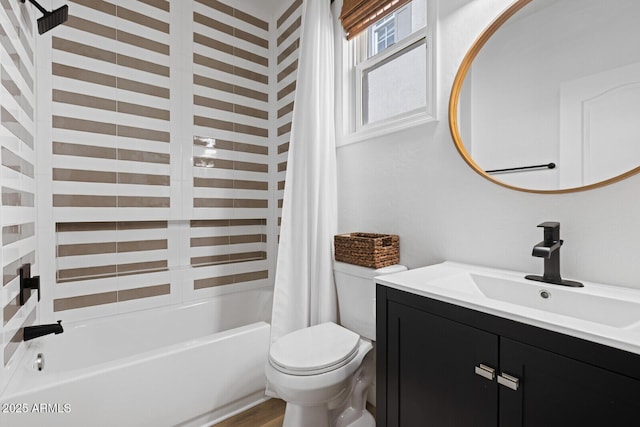 full bathroom featuring toilet, shower / tub combo, and vanity