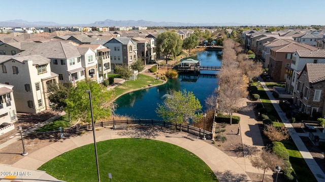 bird's eye view with a water and mountain view