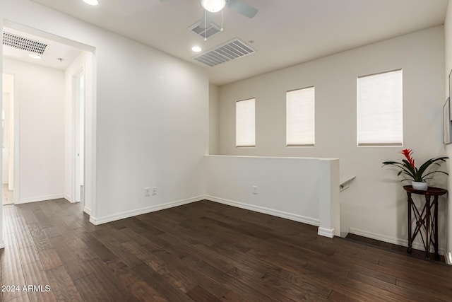 unfurnished room featuring ceiling fan, dark wood-style floors, recessed lighting, baseboards, and healthy amount of natural light