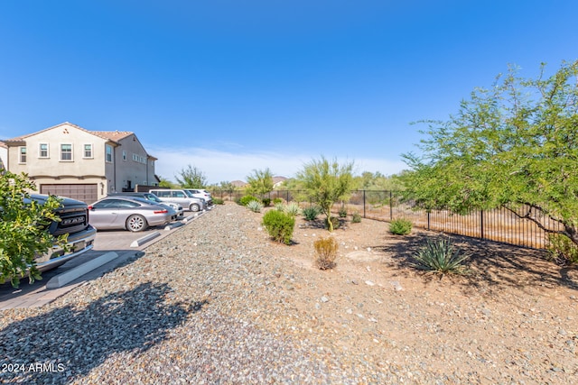 view of yard with a garage