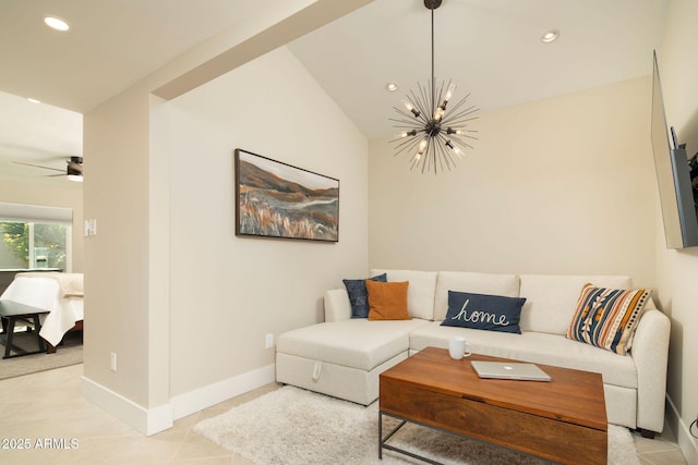 tiled living room with ceiling fan with notable chandelier